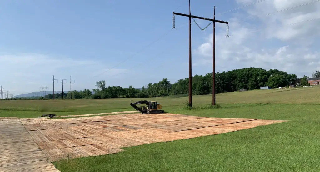 Eucalyptus timber mats on power line