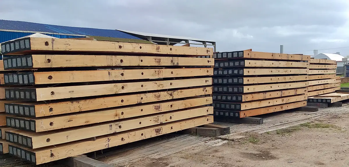 Stacked eucalyptus timber mats demonstrating cost-effective strength for ground protection applications