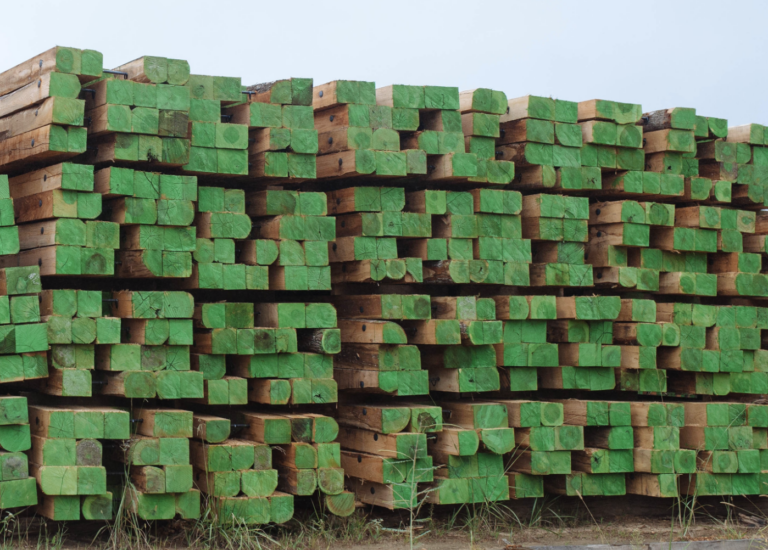 Timber mat defects showing bark, wane, and voids that reduce usable wood cross-section